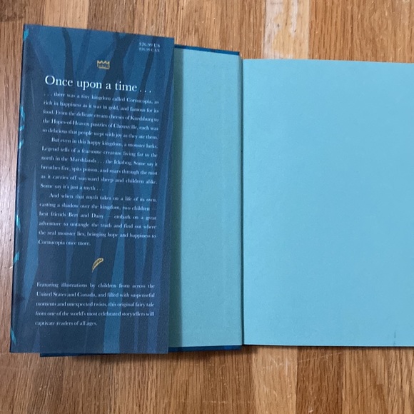 This is a hard cover book by the writer of Harry Potter JK Rowling. - Picture 3 of 3